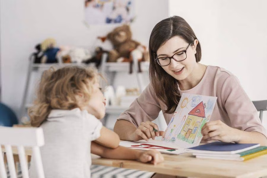speech therapist and child